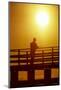 Silhouette of man fishing from a pier.-Stuart Westmorland-Mounted Photographic Print