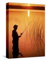 Silhouette of Man Fishing, Vilas City, WI-Ken Wardius-Stretched Canvas