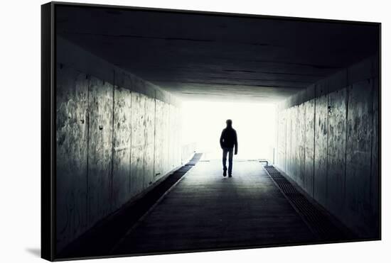 Silhouette Of Man Walking In Tunnel. Light At End Of Tunnel-Gladkov-Framed Stretched Canvas