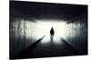 Silhouette Of Man Walking In Tunnel. Light At End Of Tunnel-Gladkov-Stretched Canvas