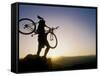 Silhouette of Mountain Biker at the Summit During Sunrise-null-Framed Stretched Canvas