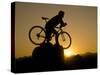 Silhouette of Mountain Biker at the Summit During Sunrise-null-Stretched Canvas