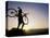 Silhouette of Mountain Biker at the Summit During Sunrise-null-Stretched Canvas