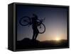 Silhouette of Mountain Biker at the Summit During Sunrise-null-Framed Stretched Canvas