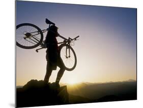 Silhouette of Mountain Biker at the Summit During Sunrise-null-Mounted Photographic Print