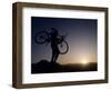 Silhouette of Mountain Biker at the Summit During Sunrise-null-Framed Photographic Print