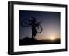 Silhouette of Mountain Biker at the Summit During Sunrise-null-Framed Photographic Print