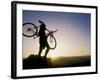 Silhouette of Mountain Biker at the Summit During Sunrise-null-Framed Photographic Print