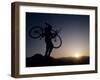 Silhouette of Mountain Biker at the Summit During Sunrise-null-Framed Photographic Print