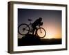 Silhouette of Mountain Biker at the Summit During Sunrise-null-Framed Photographic Print