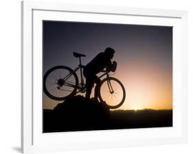 Silhouette of Mountain Biker at the Summit During Sunrise-null-Framed Photographic Print