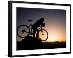 Silhouette of Mountain Biker at the Summit During Sunrise-null-Framed Photographic Print