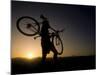 Silhouette of Mountain Biker at the Summit During Sunrise-null-Mounted Photographic Print