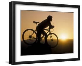 Silhouette of Mountain Biker at the Summit During Sunrise-null-Framed Photographic Print