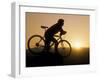 Silhouette of Mountain Biker at the Summit During Sunrise-null-Framed Photographic Print