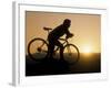 Silhouette of Mountain Biker at the Summit During Sunrise-null-Framed Photographic Print