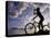 Silhouette of Mountain Biker Drinking at the Summit During Sunset-null-Stretched Canvas