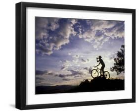 Silhouette of Mountain Biker Drinking at the Summit During Sunset-null-Framed Photographic Print