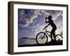 Silhouette of Mountain Biker Drinking at the Summit During Sunset-null-Framed Photographic Print