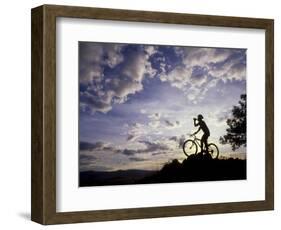 Silhouette of Mountain Biker Drinking at the Summit During Sunset-null-Framed Photographic Print