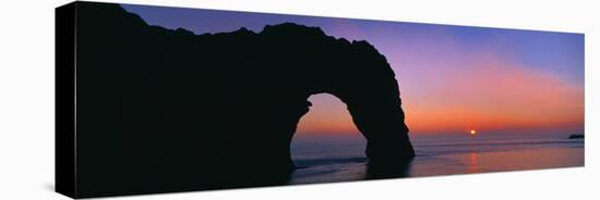 Silhouette of Natural Arch, Durdle Door, Dorset, England-null-Stretched Canvas