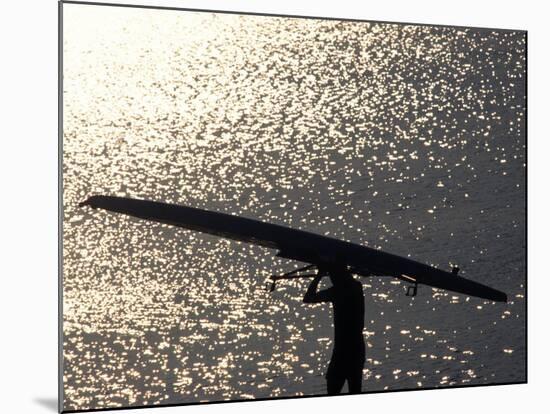 Silhouette of Rower Carrying His Boat, Vancouver Lake, Georgia, USA-null-Mounted Photographic Print