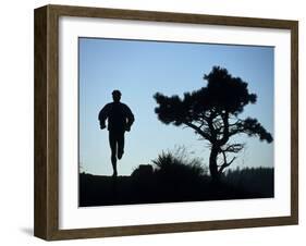 Silhouette of Runner and Tree-null-Framed Photographic Print