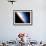 Silhouette of Space Shuttle Endeavour over Earth's Colorful Horizon-null-Framed Photographic Print displayed on a wall