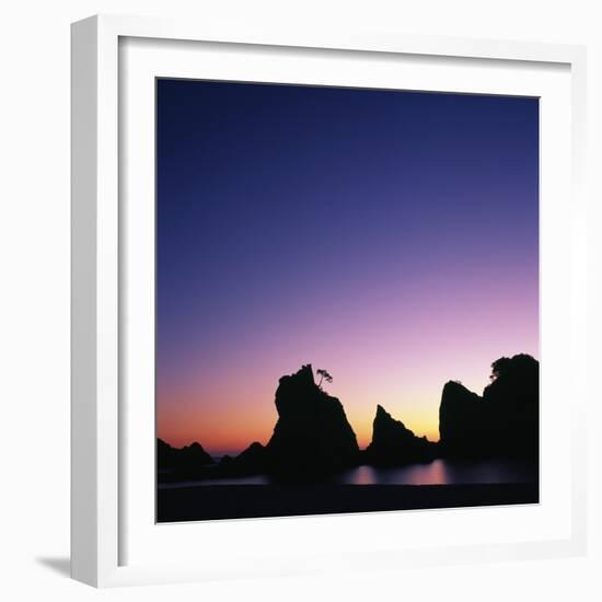 Silhouette of Stacks and Tree against Colorful Evening Sky-Micha Pawlitzki-Framed Photographic Print