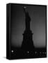 Silhouette of Statue of Liberty Lit by Two 200 Watt Lamps During Wartime Effort to Conserve Energy-Andreas Feininger-Framed Stretched Canvas