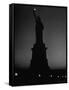 Silhouette of Statue of Liberty Lit by Two 200 Watt Lamps During Wartime Effort to Conserve Energy-Andreas Feininger-Framed Stretched Canvas