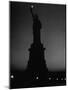 Silhouette of Statue of Liberty Lit by Two 200 Watt Lamps During Wartime Effort to Conserve Energy-Andreas Feininger-Mounted Photographic Print