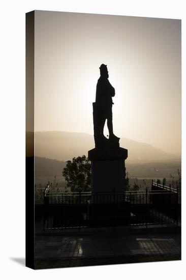 Silhouette of Statue of Robert the Bruce at Sunrise, Stirling Castle, Scotland, United Kingdom-Nick Servian-Stretched Canvas