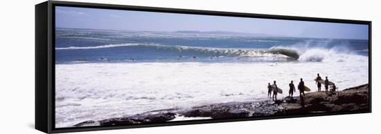 Silhouette of Surfers Standing on the Beach, Australia-null-Framed Stretched Canvas