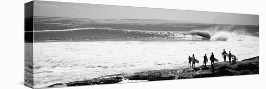 Silhouette of Surfers Standing on the Beach, Australia-null-Stretched Canvas