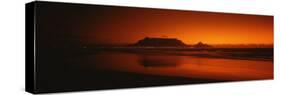 Silhouette of Table Mountain at Sunset, Table Bay, Bloubergstrand, Cape Winelands, South Africa-null-Stretched Canvas