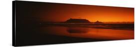 Silhouette of Table Mountain at Sunset, Table Bay, Bloubergstrand, Cape Winelands, South Africa-null-Stretched Canvas