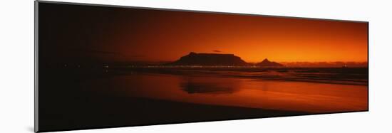 Silhouette of Table Mountain at Sunset, Table Bay, Bloubergstrand, Cape Winelands, South Africa-null-Mounted Photographic Print