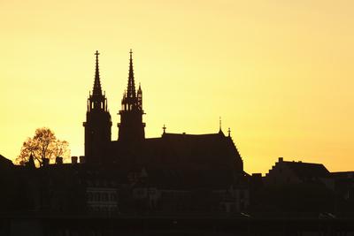 https://imgc.allpostersimages.com/img/posters/silhouette-of-the-cathedral-at-sunset-grossbasel-basel-canton-basel-stadt-switzerland-europe_u-L-PSY1C10.jpg?artPerspective=n