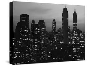 Silhouette of the Empire State Building and Other Buildings without Light During Wartime-Andreas Feininger-Stretched Canvas