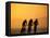 Silhouette of Three Men Riding on the Beach-Mitch Diamond-Framed Stretched Canvas