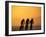 Silhouette of Three Men Riding on the Beach-Mitch Diamond-Framed Photographic Print