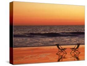 Silhouette of Two Chairs on the Beach-Mitch Diamond-Stretched Canvas