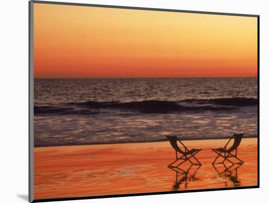 Silhouette of Two Chairs on the Beach-Mitch Diamond-Mounted Photographic Print