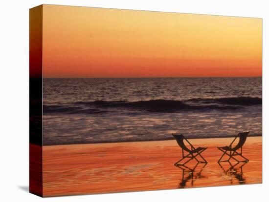 Silhouette of Two Chairs on the Beach-Mitch Diamond-Stretched Canvas