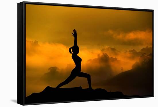 Silhouette of Woman Doing Yoga Meditation During Sunrise with Natural Golden Sunlight on Mountain-szefei-Framed Stretched Canvas