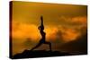 Silhouette of Woman Doing Yoga Meditation During Sunrise with Natural Golden Sunlight on Mountain-szefei-Stretched Canvas