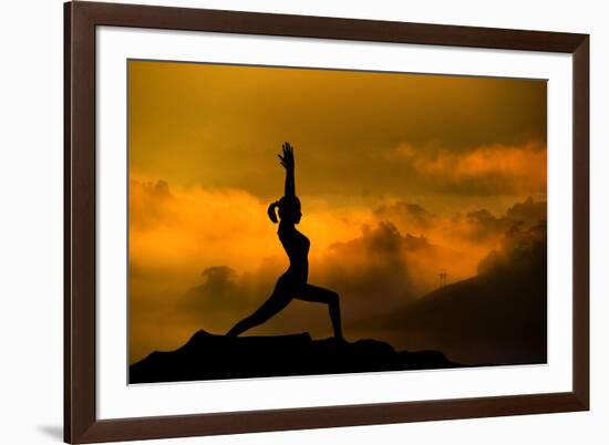 Silhouette of Woman Doing Yoga Meditation During Sunrise with Natural Golden Sunlight on Mountain-szefei-Framed Photographic Print