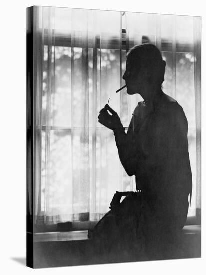 Silhouette of Woman Lighting Cigarette Photograph - New York, NY-Lantern Press-Stretched Canvas