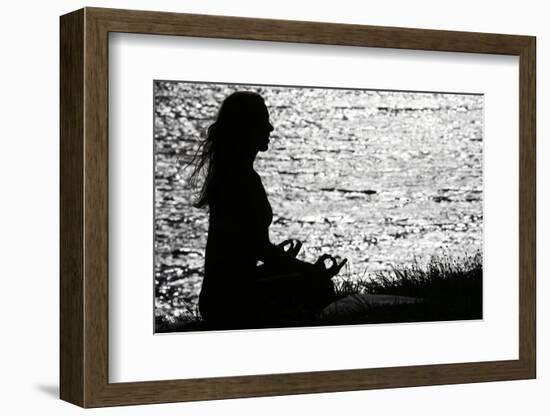 Silhouette of woman practicing yoga at sunset. Lotus position. French Alps. France-null-Framed Photographic Print